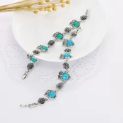 Silversmyckeset - med ugglor - halsband / örhängen / armband