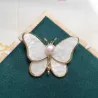 Borboleta de concha com pérola - broche