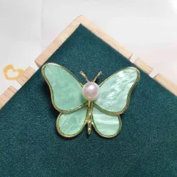Borboleta de concha com pérola - broche