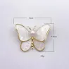 Papillon coquillage blanc - avec une perle - broche