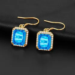 Boucles d'oreilles dorées avec topaze cristal bleu / strass