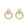 Boucles d'oreilles rondes dorées élégantes - avec opale blanche