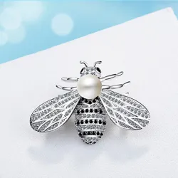 Biformet sølvbroche - med perle