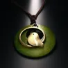 Pendentif en bois avec oiseau - collier corde