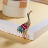 Grue en cristal avec perle - broche