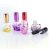 Parfymflaska i glas - tom behållare - med atomizer - skalleform - 8ml