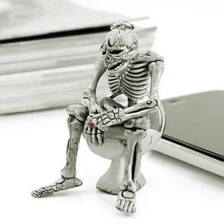 Skeleton sitting on the toilet - rubber keychainKeyrings