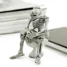 Skeleton istuu wc - kumi avaimenperä