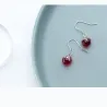 Boule cristal rouge / flocon de neige - boucles d'oreilles