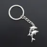 Porte-clés en argent - avec double dauphins