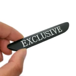 Emblemat na samochód - metalowa naklejka - EXCLUSIVENaklejki