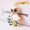 Hibou en cristal blanc assis sur la branche - porte-clés