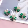 Four crystal green leaves - brooch - 12 pieces setBrooches