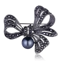 Broche fleur en cristal - avec perle noire