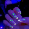 Dekorative leuchtende Nagelaufkleber