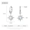 Boucles d'oreilles rondes avec une étoile / opale