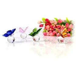 Papillon / boule en cristal coloré - figurine