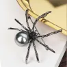 Schwarze Spinne mit Perle - elegante Brosche