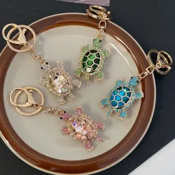 llaveroLlavero tortuga de cristal - rosa - blanco - turquesa - verde