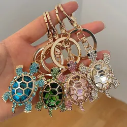 llaveroLlavero tortuga de cristal - rosa - blanco - turquesa - verde