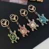 llaveroLlavero tortuga de cristal - rosa - blanco - turquesa - verde
