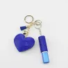 Chaveiro em formato de coração com diamante - com cordão estiloso e frasco de perfume pequeno.