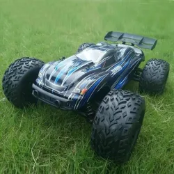 CarrosJLB Racing CHEETAH 1/10 Coche RC sin cepillos Truggy 21101 RTR