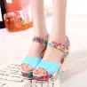 Fiore modello cuneo tallone sandali