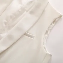 Elegantti hihaton takki