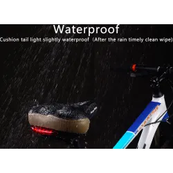 Bicycle saddle with warning light