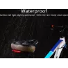 Bicycle saddle with warning light