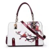 Bolsos de manoBolso de cuero con estampado floral