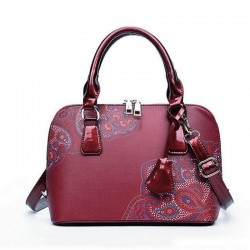 Leather bag with floral print