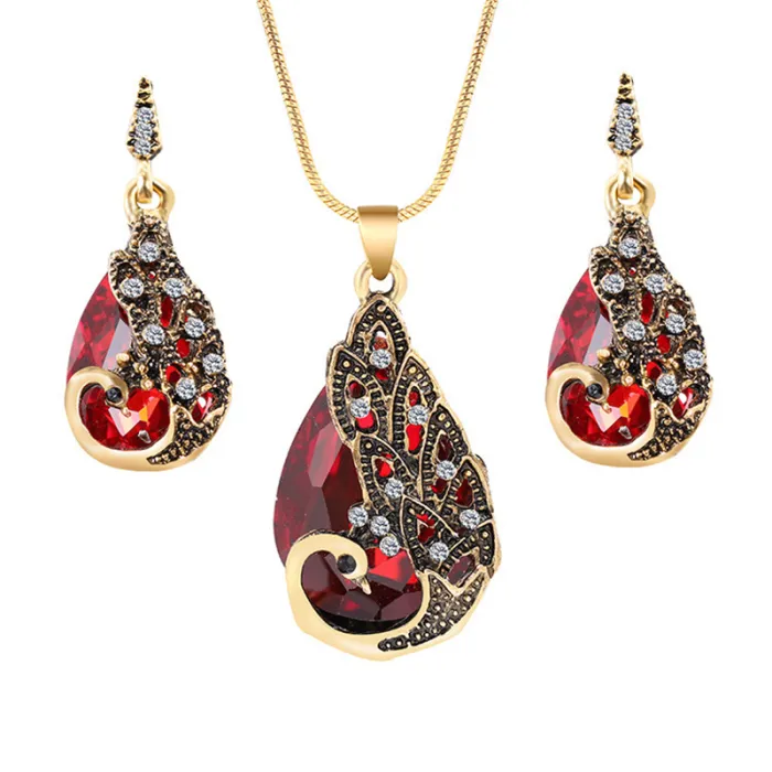 Orecchini e collana con pavone di cristallo - set di gioielli
