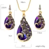 Orecchini e collana con pavone di cristallo - set di gioielli