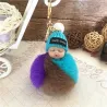 Boneca de bebê dormindo - chaveiro com pompom de pele