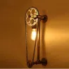 Vintage vägg lampa med cykelkedja