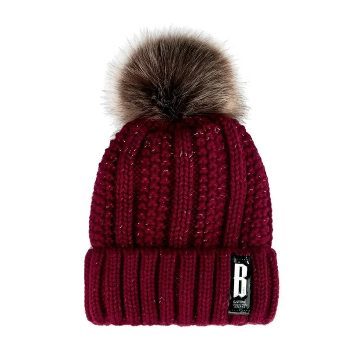 Warm winter wool hat with pom pom