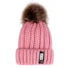 Warm winter wool hat with pom pom