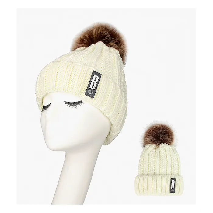 Warm winter wool hat with pom pom
