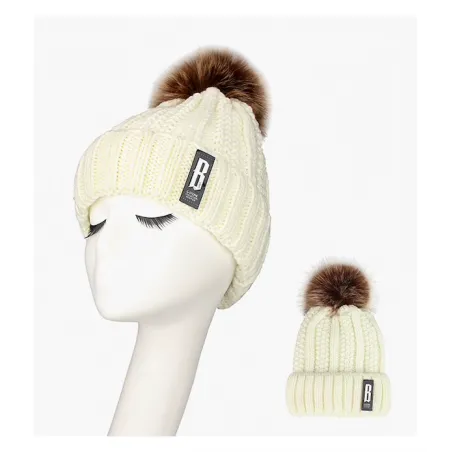 Warm winter wool hat with pom pom