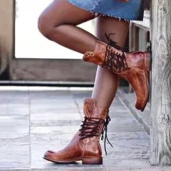 BotasBotas de invierno de cuero con cierre trasero