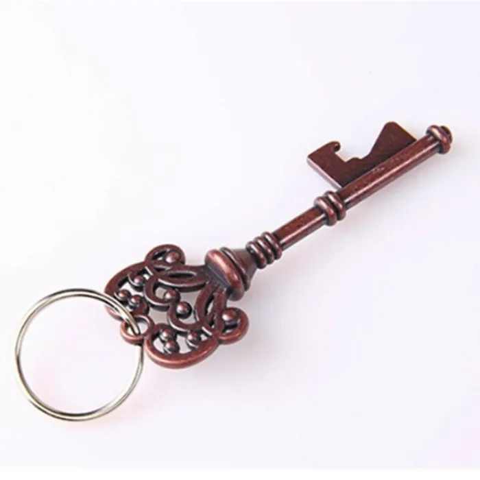 Nyckelformad flasköppnare med keyring