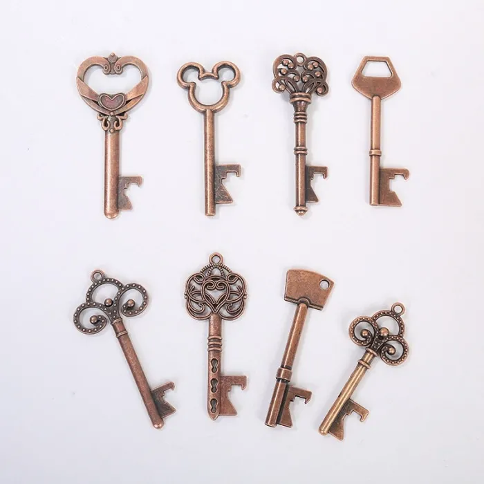 Keskeinen muotoinen pullon avaaja - vintage keychain