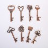Nyckelformad flasköppnare - vintage keychain