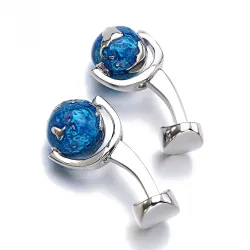 Muoti cufflinssit sinisellä pyörivällä maailmalla
