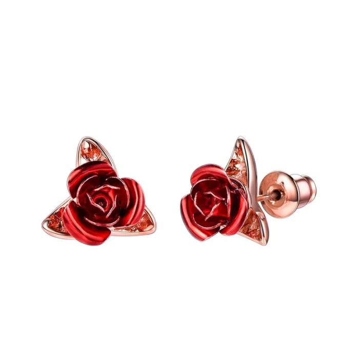 Gold stud earrings with red roseOorbellen