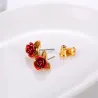 Gold stud earrings with red rose