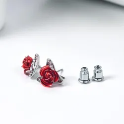 Gold stud earrings with red rose