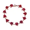 Pulseira de ouro e prata com rosas vermelhas